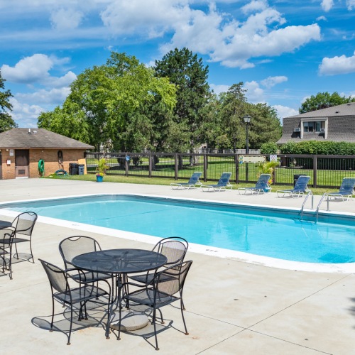 Swimming pool with pool furniture