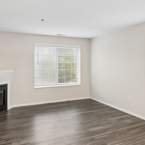 vacant livingroom with fireplace